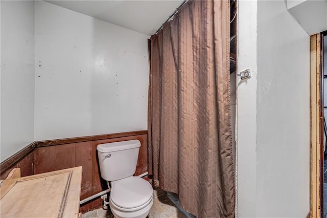 160 SW 131st Hwy, Holden, MO 64040 - full bathroom with a wainscoted wall and curtained shower
