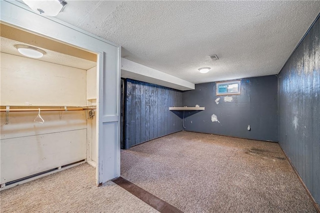 160 SW 131st Hwy, Holden, MO 64040 - below grade area featuring carpet and a textured ceiling