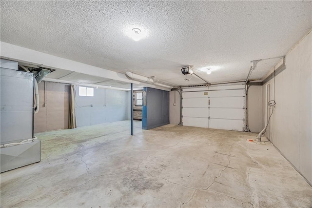 160 SW 131st Hwy, Holden, MO 64040 - garage with a garage door opener and heating unit