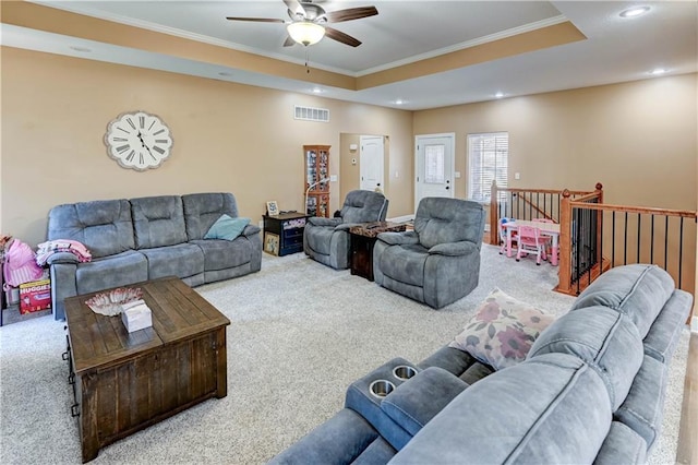 966 Moore Pl, Odessa, MO 64076 - living room with ornamental molding, carpet floors, a ceiling fan, recessed lighting, and a tray ceiling
