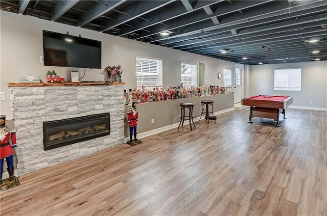 966 Moore Pl, Odessa, MO 64076 - rec room featuring wood finished floors, billiards, and a stone fireplace
