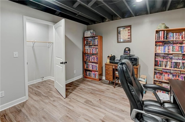 966 Moore Pl, Odessa, MO 64076 - office area with light wood-style floors and baseboards