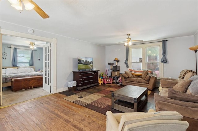 201 N Steuben Ave, Chanute, KS 66720 - living room with a ceiling fan, healthy amount of natural light, and hardwood / wood-style flooring