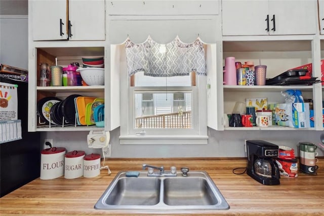 201 N Steuben Ave, Chanute, KS 66720 - storage area featuring a sink