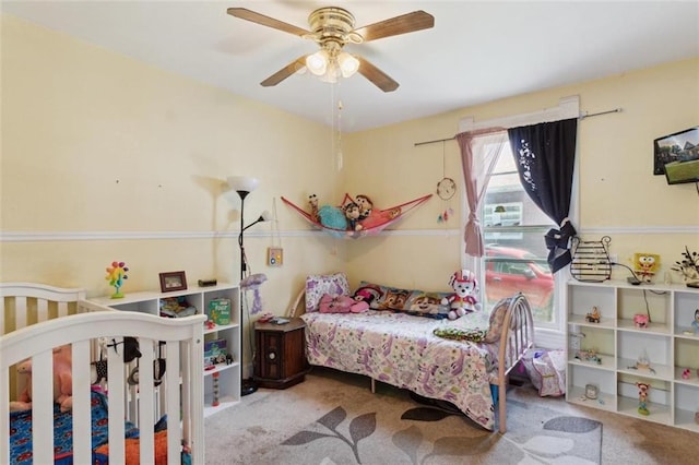201 N Steuben Ave, Chanute, KS 66720 - carpeted bedroom with ceiling fan
