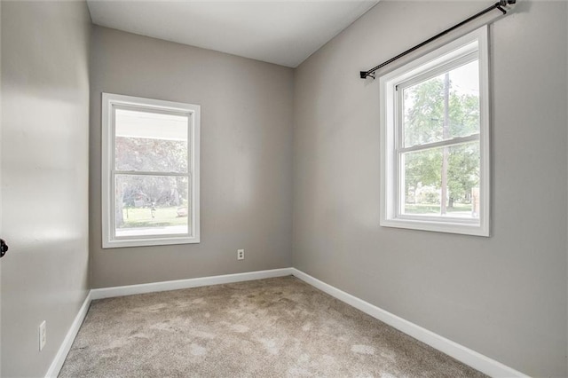 114 W 2nd St, Garden City, MO 64747 - carpeted spare room with baseboards