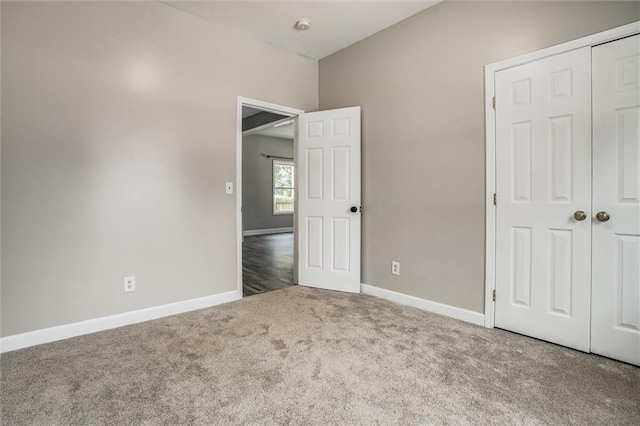 114 W 2nd St, Garden City, MO 64747 - unfurnished bedroom featuring carpet floors, baseboards, and a closet