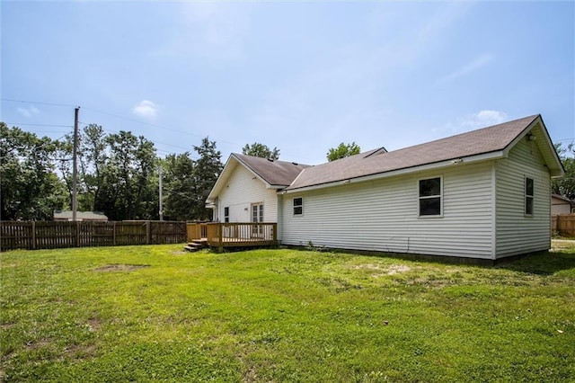 114 W 2nd St, Garden City, MO 64747 - back of house featuring a deck