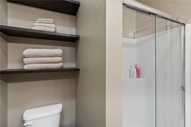 7907 W 59th Ter, Merriam, KS 66202 - bathroom with a shower stall and toilet