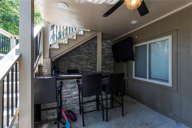 7907 W 59th Ter, Merriam, KS 66202 - view of patio / terrace featuring an outdoor bar, stairway, and ceiling fan