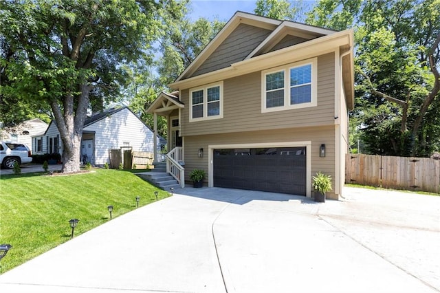 7907 W 59th Ter, Merriam, KS 66202 - view of front of house featuring an attached garage and concrete driveway