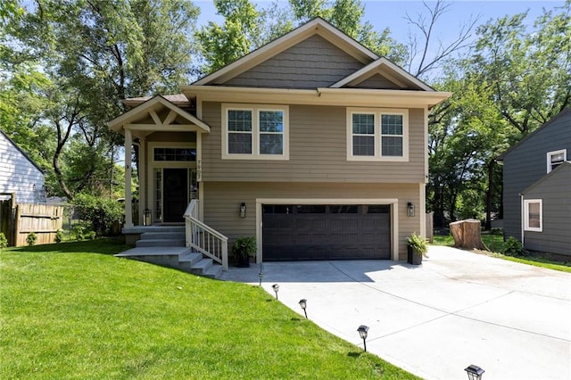 7907 W 59th Ter, Merriam, KS 66202 - view of front of property featuring a garage and driveway