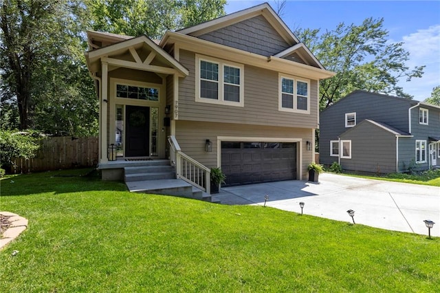 7907 W 59th Ter, Merriam, KS 66202 - view of front facade with an attached garage and concrete driveway
