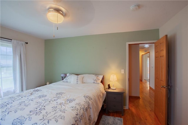 501 N Franklin St, Spring Hill, KS 66083 - bedroom with wood finished floors and baseboards