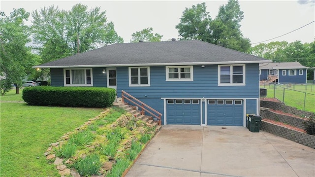 501 N Franklin St, Spring Hill, KS 66083 - ranch-style home featuring an attached garage, concrete driveway, and stairway