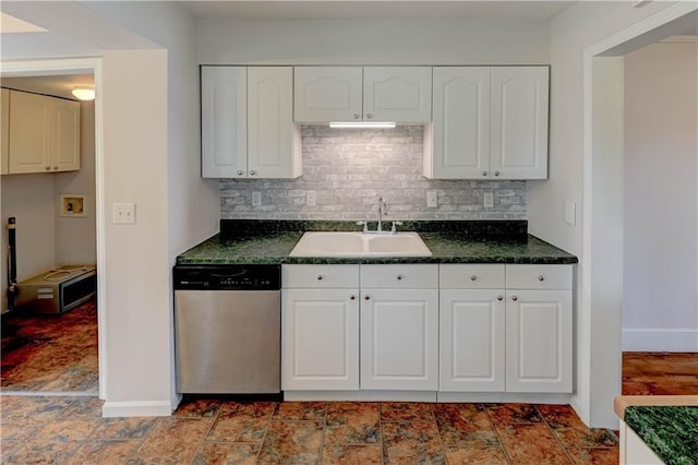 8 S Mulberry St, Louisburg, KS 66053 - kitchen with stainless steel dishwasher, a sink, dark countertops, and tasteful backsplash