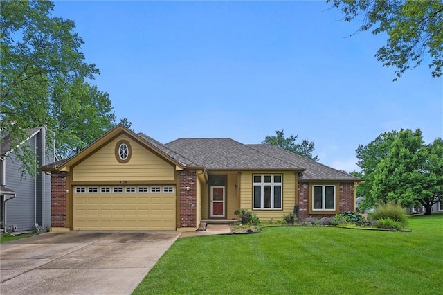 409 SW Cole Younger Dr, Lees Summit, MO 64082 - ranch-style home with an attached garage, driveway, a front yard, and brick siding