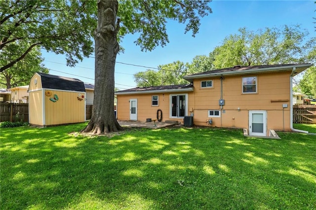 1203 S Skyline Dr, Liberty, MO 64068 - back of property with a shed and a patio area