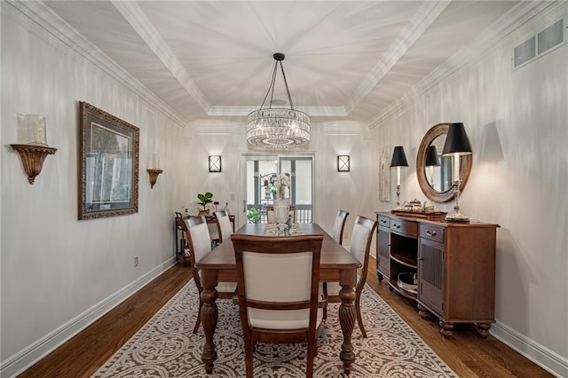 14208 Larsen St, Overland Park, KS 66221 - dining space with a chandelier, dark wood-style flooring, and ornamental molding