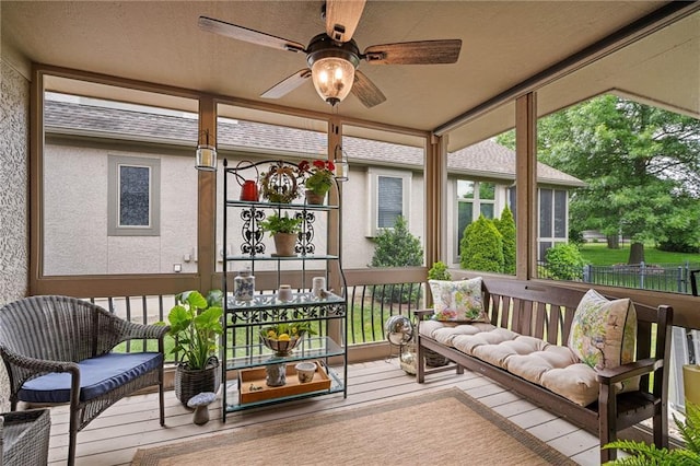 14208 Larsen St, Overland Park, KS 66221 - sunroom with a ceiling fan