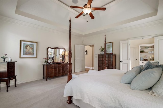 14208 Larsen St, Overland Park, KS 66221 - bedroom featuring a raised ceiling, light carpet, ornamental molding, and a ceiling fan