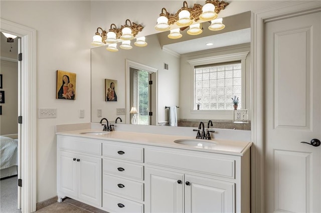 14208 Larsen St, Overland Park, KS 66221 - ensuite bathroom featuring double vanity, a chandelier, crown molding, and tile patterned flooring