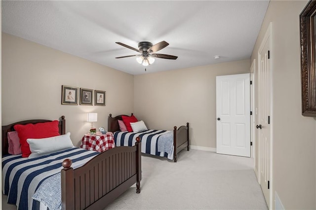 14208 Larsen St, Overland Park, KS 66221 - bedroom featuring light carpet and a ceiling fan
