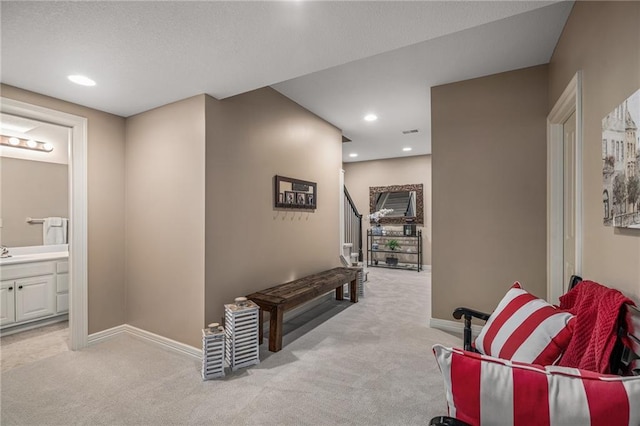14208 Larsen St, Overland Park, KS 66221 - hall featuring light carpet, recessed lighting, and stairway