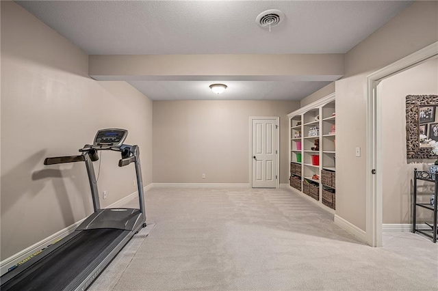 14208 Larsen St, Overland Park, KS 66221 - workout room with light carpet and built in features