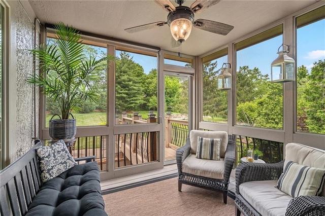 14208 Larsen St, Overland Park, KS 66221 - sunroom with a ceiling fan