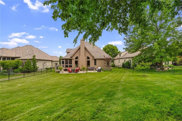 14208 Larsen St, Overland Park, KS 66221 - back of property featuring stucco siding, a patio, a chimney, and a fenced backyard