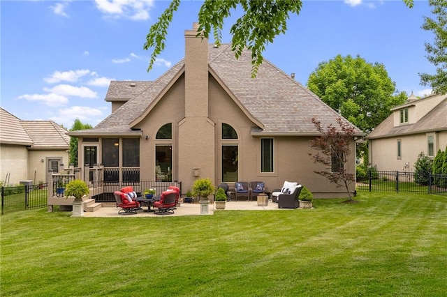 14208 Larsen St, Overland Park, KS 66221 - rear view of house featuring outdoor lounge area, a sunroom, a fenced backyard, and a patio