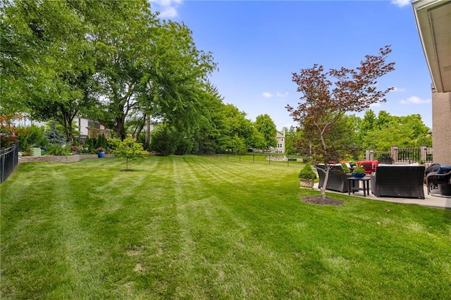 14208 Larsen St, Overland Park, KS 66221 - view of yard featuring an outdoor hangout area and a patio