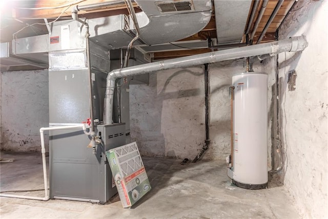 6645 Cherry St, Kansas City, MO 64131 - utility room with water heater and heating unit