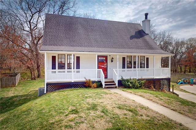334 Fawn Valley Ct, Lansing, KS 66043 - view of front of property featuring a porch, a chimney, and a shingled roof
