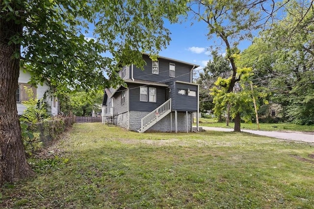5701 Wabash Ave, Kansas City, MO 64130 - rear view of house with stairway