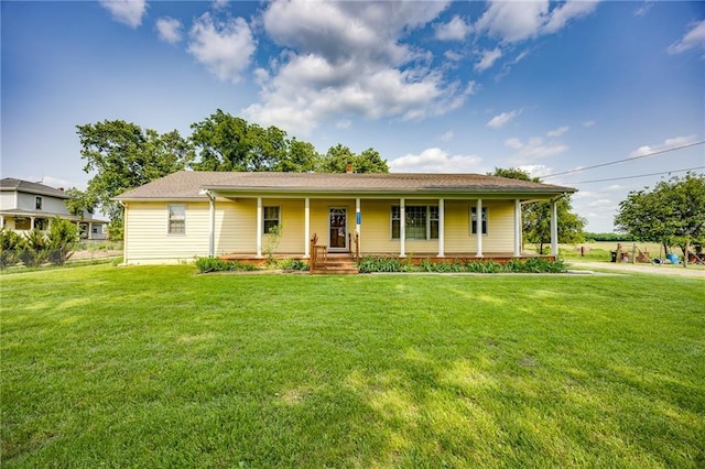 1110 E 1600th Rd, Lawrence, KS 66046 - view of front of house with a porch and a front yard