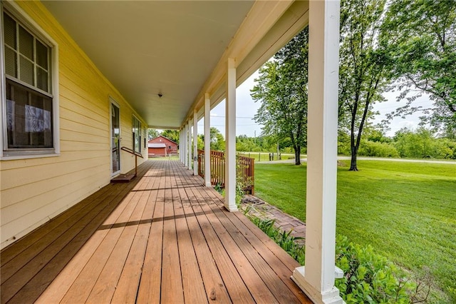 1110 E 1600th Rd, Lawrence, KS 66046 - wooden deck with a lawn