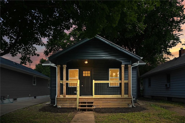 1220 E 24th Ave, Kansas City, MO 64116 - view of front of property featuring a porch