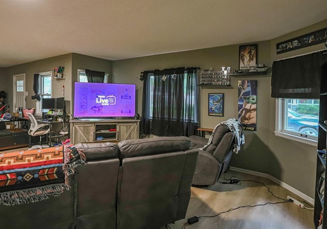 300 Brown Ave, Osawatomie, KS 66064 - living area with carpet floors and a textured ceiling