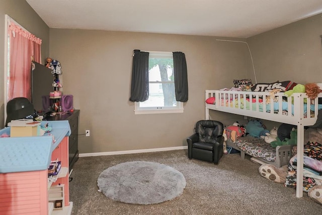 300 Brown Ave, Osawatomie, KS 66064 - carpeted bedroom with baseboards