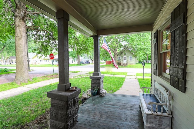 300 Brown Ave, Osawatomie, KS 66064 - porch with a yard and a residential view