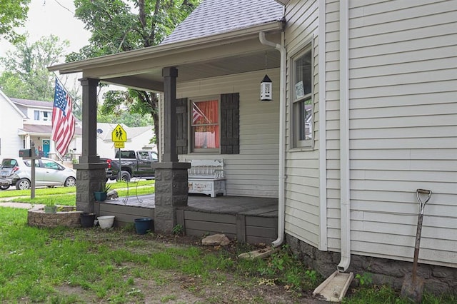 300 Brown Ave, Osawatomie, KS 66064 - view of side of home featuring covered porch