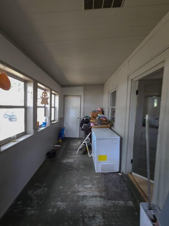 300 Brown Ave, Osawatomie, KS 66064 - sunroom / solarium featuring washer / dryer