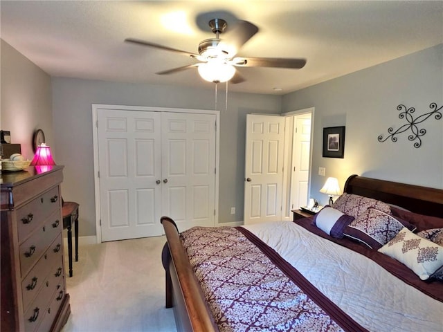 5325 Bryant Bottom Rd, Blackwater, MO 65322 - bedroom with light colored carpet, a closet, ceiling fan, and baseboards