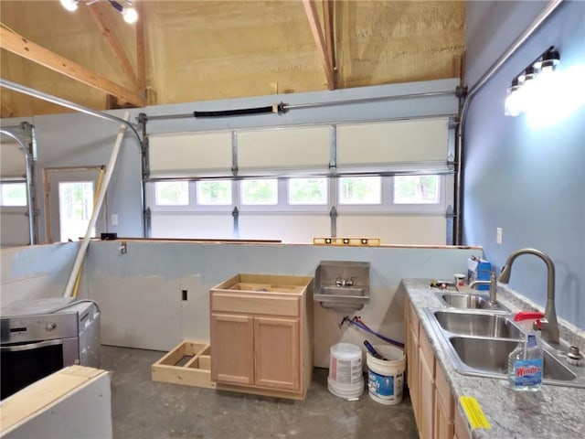 5325 Bryant Bottom Rd, Blackwater, MO 65322 - garage featuring a sink