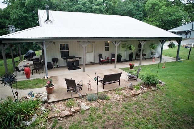 5325 Bryant Bottom Rd, Blackwater, MO 65322 - back of house featuring a patio, a yard, outdoor lounge area, and metal roof
