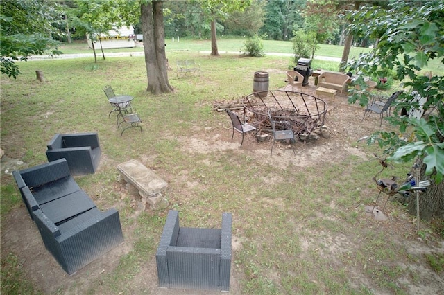 5325 Bryant Bottom Rd, Blackwater, MO 65322 - view of green lawn with an outdoor fire pit