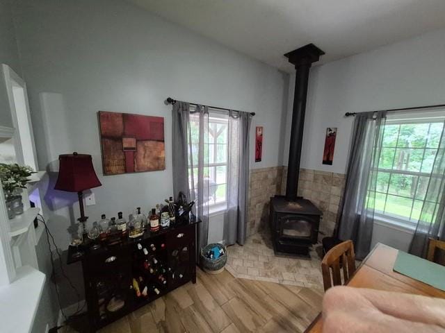 5325 Bryant Bottom Rd, Blackwater, MO 65322 - living area featuring a wood stove and wood finished floors