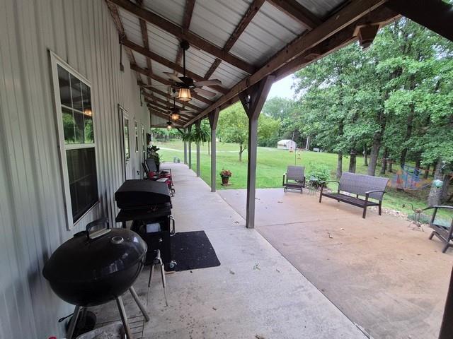5325 Bryant Bottom Rd, Blackwater, MO 65322 - view of patio / terrace with ceiling fan and grilling area